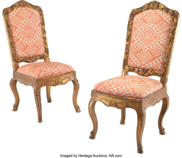 A Pair of Continental Rococo Giltwood Upholstered Side Chairs (18th century)