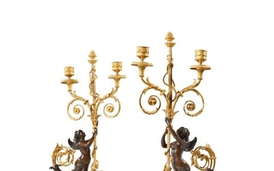 A Pair of Gilt and Patinated Bronze and Blued Steel Two-Light Candelabra After a Design by François Rémond, Circa 1820