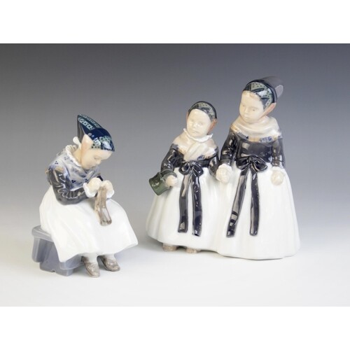 A Royal Copenhagen figural group, 20th century, modelled as ...