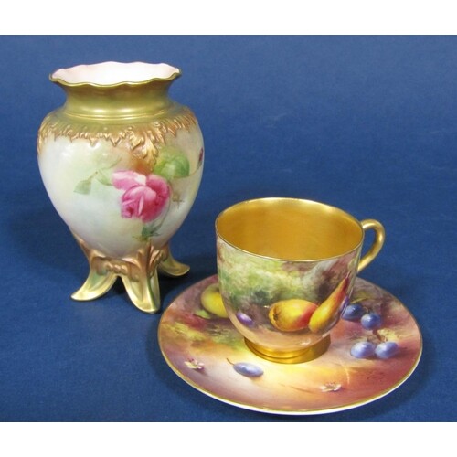 A Royal Worcester cabinet cup and saucer with finely painted...