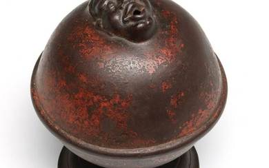 A SCARCE 19TH C. IRON STRING HOLDER WITH MAN'S FACE