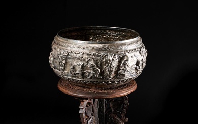 A SILVER BURMESE BOWL & WOODEN STAND, 19TH CENTURY