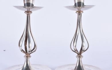 A STYLISH PAIR OF ART NOUVEAU SILVER PLATED CANDLESTICKS. 15...