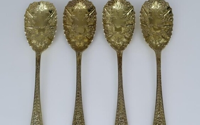 A Set of Four Victorian Silver Gilt Table Spoons,...