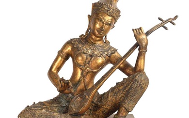 A South East Asian gilt metal figure modelled as the...