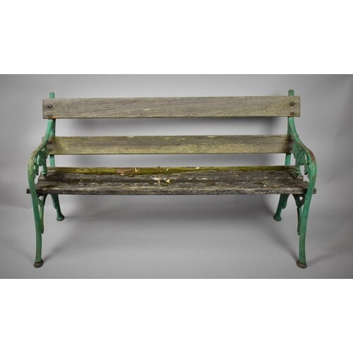 A Victorian Cast Iron and Wooden Lath Bench with Vine Leaf D...