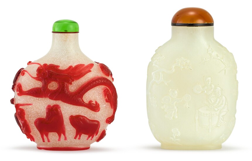 A WHITE JADE 'BOYS' SNUFF BOTTLE AND A RUBY OVERLAY GLASS 'DRAGON' SNUFF BOTTLE QING DYNASTY