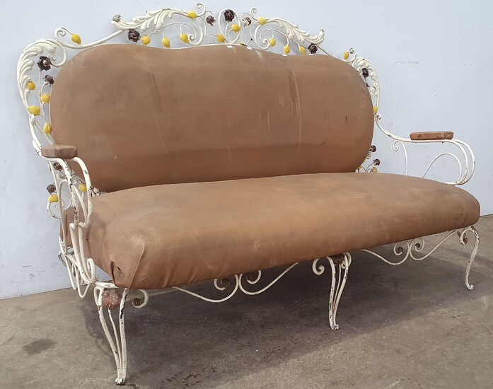 A WROUGHT IRON FRENCH STYLE THREE SEATER SETTEE