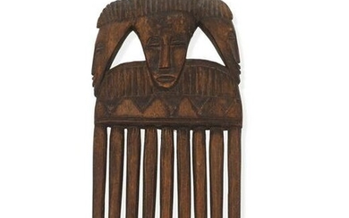 A West African carved wood comb