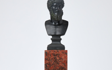 A bust of the emperor, 18th/20th century, depicting the Roman Emperor Lucius Verus, patinated bronze, granite and marble plinth and bronze/brass ball feet.