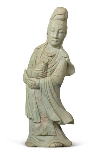 A carved stone figure of Guanyin