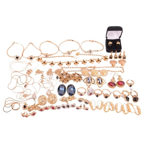 A collection of costume jewellery featuring mostly black, bl...