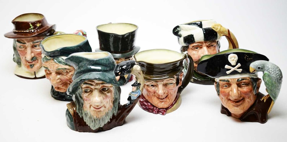 A collection of seven Royal Doulton Toby Jugs.