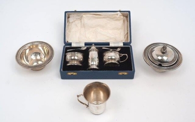 A continental christening cup with flared rim, stamped 925, 7.7cm high, together with a cased Mappin & Webb silver cruet set, Sheffield, 1968, one spoon associated, the other 1967; a continental sugar bowl with cover, stamped 800, with blue glass...