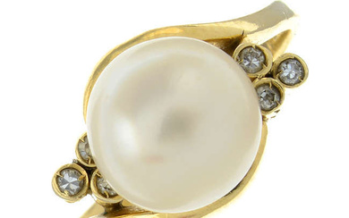 A cultured pearl crossover ring, with single-cut diamond trefoil surround.