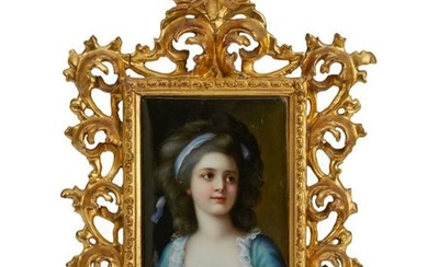 A framed painted porcelain portrait plaque