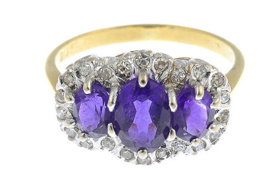 A gold amethyst and diamond dress ring.