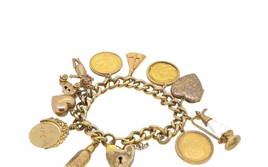 A gold plated charm bracelet with sovereigns