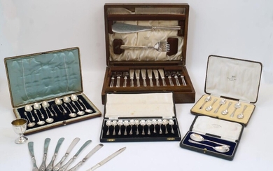A group of silver and silver plate, comprising: a Victorian cased set of 12 apostle spoons and a pair of sugar tongs, Sheffield, 1884, Martin, Hall & Co, with twisted stems; a cased set of six teaspoons, Sheffield, 1930, Walker & Hall; a cased set...