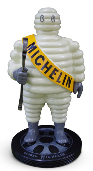 A hand-painted 'Mr Bibendum' standing forecourt figure