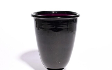 A large amethyst glass vase c.1800, the tall rounded funnel...