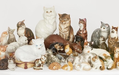 A large collection of pottery cats, to include a Wedgwood ginger cat, hand-painted with factory stamp to base, 16.5cm, a Lladro ceramic model of a crouching Siamese cat designed by Juan Huerta, with factory stamp to base and additional incised...
