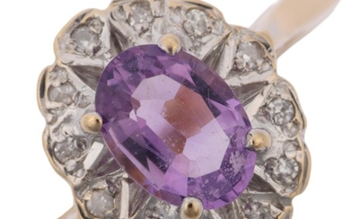 A late 20th century 9ct gold amethyst and diamond oval clust...