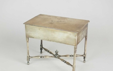A novelty silver trinket box in the form of a table