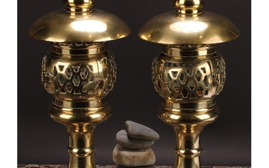 A pair of 19th century brass pagoda temple lamps, each with ...