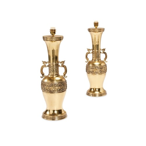 A pair of Chinese gilt brass table lamps Each with long neck...