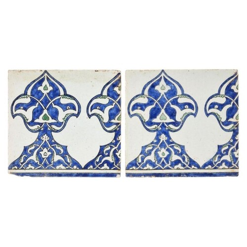 A pair of Damascus underglaze painted pottery border tiles, ...