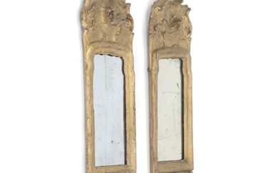 SOLD. A pair of Danish rococo carved giltwood mirrors each with one later brass candleholder. Mid-18th century. H. 61 cm. W. 17 cm. (2) – Bruun Rasmussen Auctioneers of Fine Art