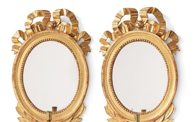 A pair of Gustavian late 18th century one-light girandole mirrors.