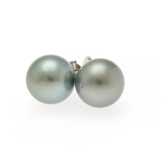 A pair of Tahiti pearl ear studs each set with a cultured Tahiti pearl, mounted in 14k white gold. Diam. app. 12.7 mm. (2)