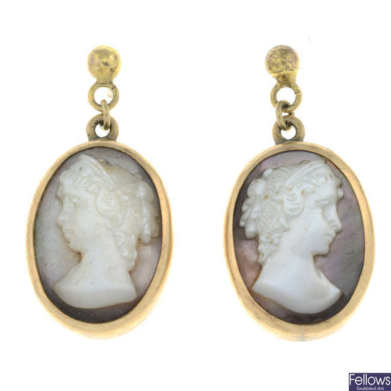 A pair of mother-or-pearl cameo drop earrings.