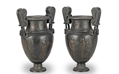 A pair of patinated bronze vases
