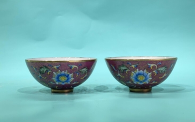 A pair of rare Chinese enamel fuchsia bowls with...