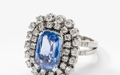 A sapphire and diamond cluster ring 20th century...
