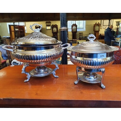 A silver plated tureen, 41 cm wide, another smaller, a champ...
