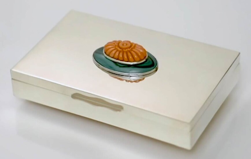 A sterling silver casket, the lid decorated with malachite...