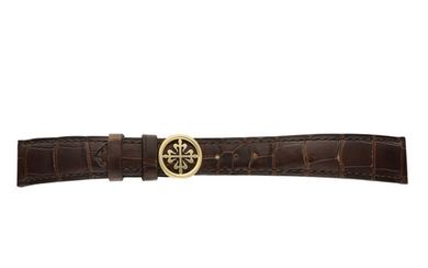 A strap with yellow gold folding buckle