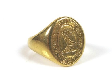 A yellow metal armorial signet ring, no hallmarks, size K, 7...