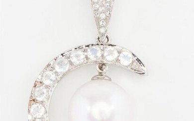 AN AKOYA PEARL, DIAMOND AND MOONSTONE PENDANT SET WITH A ROUND PEARL MEASURING 9MM, SUSPENDED WITHIN A CRESCENT SHAPED SURROUND SET...