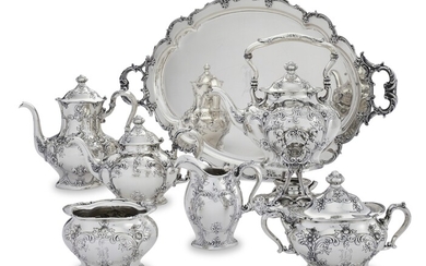 AN AMERICAN SILVER SIX-PIECE TEA AND COFFEE SERVICE AND TWO-HANDLED TRAY