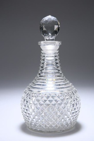 AN EARLY 19TH CENTURY CUT-GLASS DECANTER, PROBABLY
