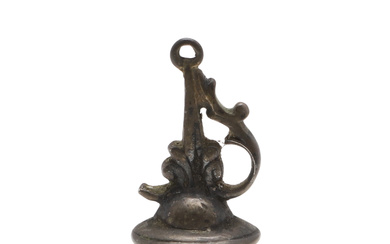 AN EARLY 19TH CENTURY GILT METAL FOB SEAL WITH ARABIC SCRIPT.