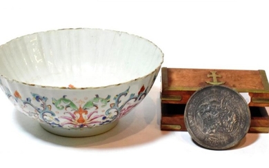 An 18th century Chinese bowl with various scenes of birds...