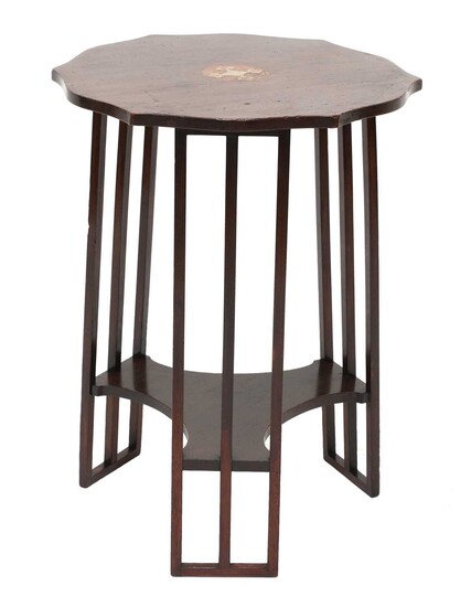 An Art Nouveau mahogany inlaid occasional table