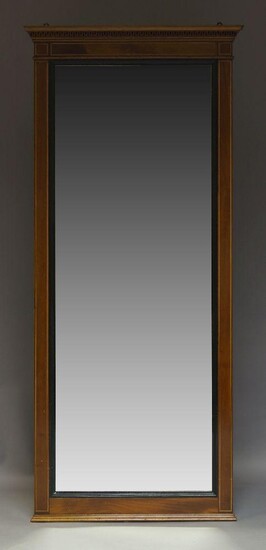 An Edwardian mahogany and line inlaid wall mirror, with dentil...