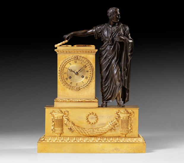 An Empire patinated and gilt-bronze mantel clock, early 19th century | Pendule à l'effigie de Napoléon en bronze patiné et doré d'époque Empire